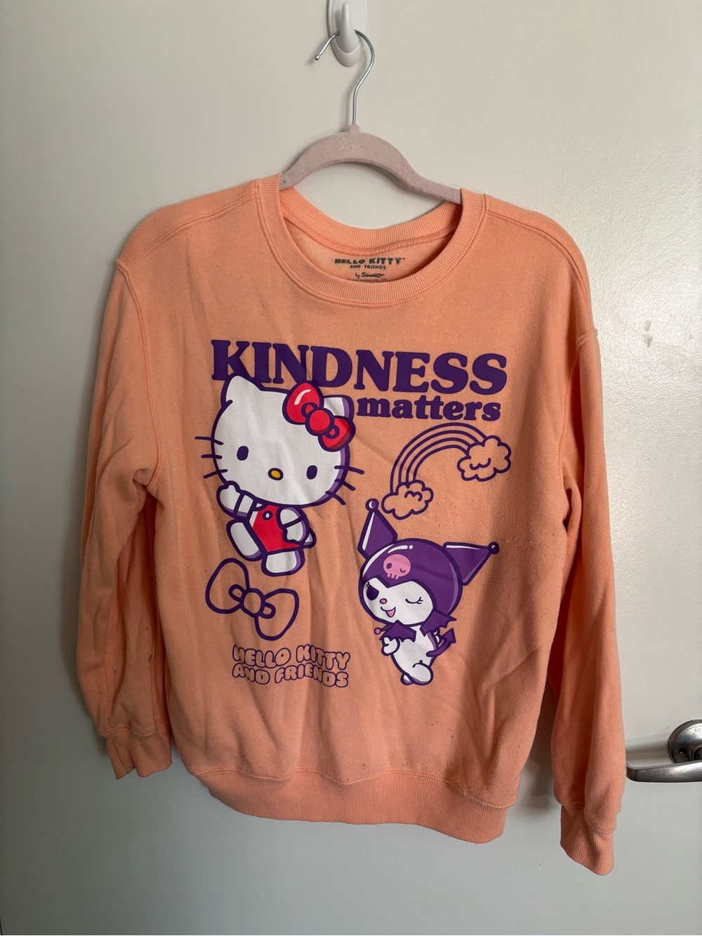 Sanrio Hello Kitty Peach Pullover with Purple Print